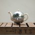 chrome covered tea pot
