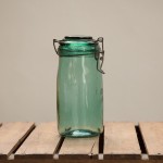 green glass storage jar