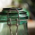 green glass storage jar